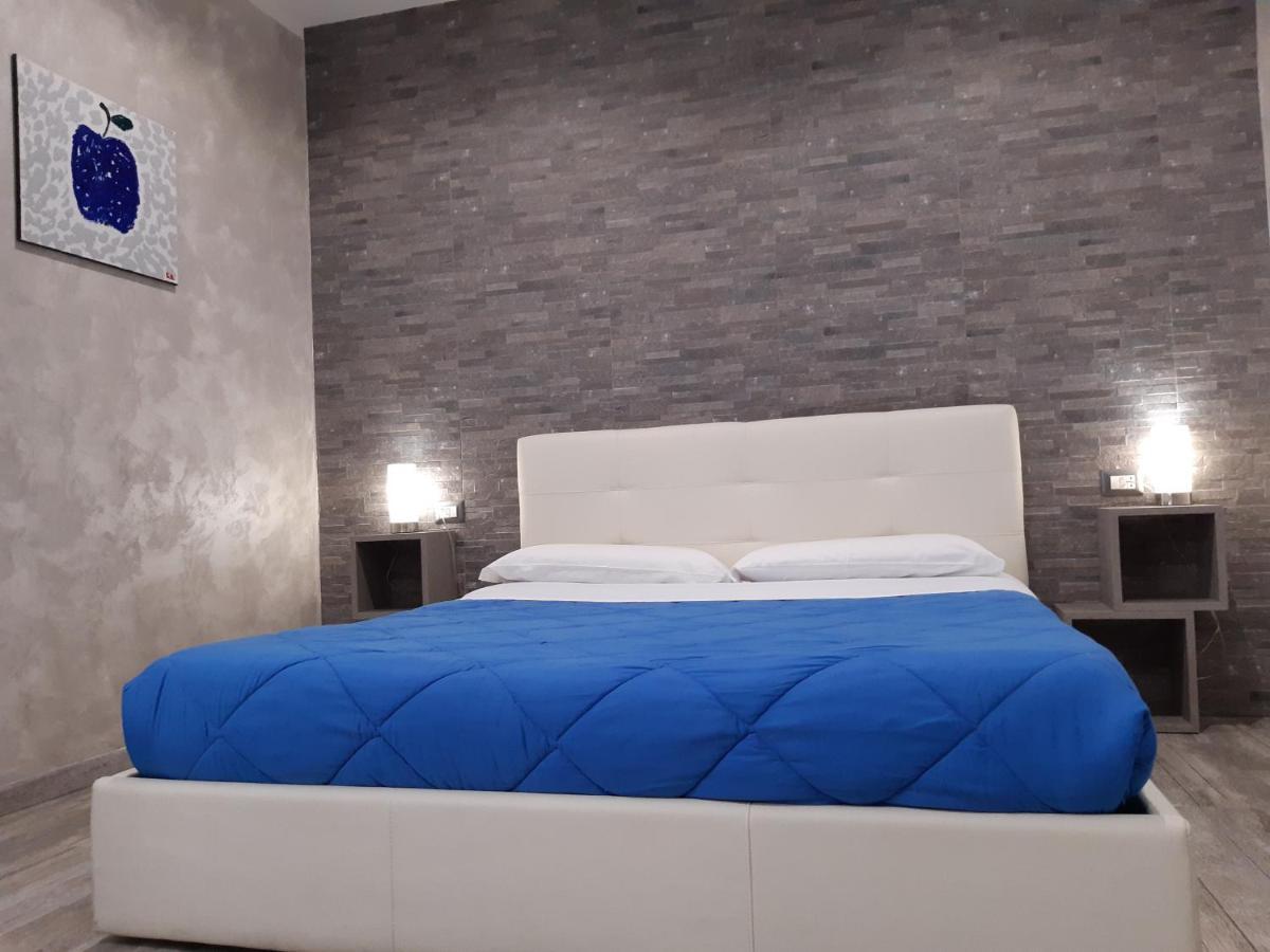Apple Rooms Rome Airport Φιουμιτσίνο Εξωτερικό φωτογραφία A bed